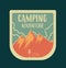 Camping emblem with clouds and mountains, created in retro style