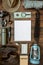 Camping gear including knife, clothes, boots, lantern, camera, hat, map, compass. Vertical wanderlust, safari postcard, poster,