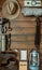 Camping gear including knife, clothes, boots, lantern, camera, hat, map, compass. Vertical wanderlust, safari postcard, poster,