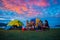 Camping of happy asian young travellers at lake