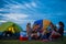 Camping of happy asian young travellers at lake