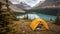 Camping with holding cup in yellow tent open with Peyto Lake in Icefields Parkway at Canada