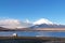 Camping house, lake, blue sky, Fuji mountain with snow in Japan countryside