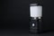 Camping lantern on black background, space for text. Military training equipment