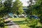 Camping at river meadow in vans and tents