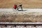 Camping roadtrip with a bicycle next to a railroad.