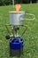 Camping stove in grass