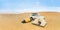 Camping in the Sudanese desert with two small tents, an off-road