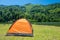 Camping tent at scenic campsite on a lake