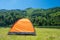 Camping tent at scenic campsite on a lake