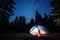 a camping tent under starry night sky