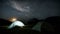 Camping in tent under stars sky in dark starry night Time lapse