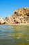 Camping of three tents on a sandy wild beach