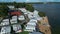 camping with trailers and campers at sea shore with beach, campsite aerial view