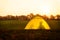 Camping and traveling, tent with the silhouettes of a woman and her dog