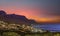 Camps bay illuminated at night with twilight sky in cape town south africa