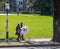 Campus of Princeton University - Two Students Carrying Big White