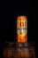 Can of Holsten beer on beer barrel with dark background. Illustrative editorial photo shot in Bucharest, Romania, 2021