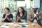 They can just feel their next big success coming along. Shot of a group of businesspeople applauding in an office.