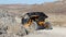 Can-Am Maverick all-terrain vehicle ATV driving down an unpaved mountain road, La Paz, BCS, Mexico