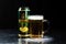 Can of Perlenbacher Radler beer and beer glass on dark background. Illustrative editorial photo shot in Bucharest, Romania, 2021