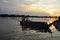 Can Tho, Vietnam. Boat on Mekong river by sunset