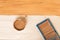 A can of varnish and a paint bath on a wooden floor, on top there is a place for inscription