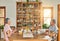 Can you please pass the salt. Shot of a cheerful elderly couple having breakfast together around a table at home during