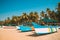 Canacona, Goa, India. Sightseeing Tourist Boats Parked On Famous Palolem Beach In Summer Sunny Day