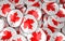 Canada Badges Background - Pile of Canadian Flag Buttons.