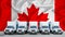 Canada flag in the background. Five new white trucks are parked in the parking lot. Truck, transport, freight transport. Freight
