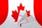 Canada flag depicted on paper origami airplane. Handmade arts concept