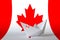 Canada flag depicted on paper origami ship closeup. Handmade arts concept