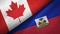 Canada and Haiti two flags textile cloth, fabric texture