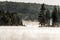 Canada Ontario Lake of two rivers Canoe Canoes foggy water sunrise fog golden hour on water in Algonquin National Park