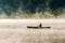 Canada Ontario Lake of two rivers Canoe Canoes foggy water sunrise fog golden hour on water in Algonquin National Park