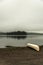 Canada Ontario Lake two rivers grey morning dark atmosphere Canoe Canoes parked beach water in Algonquin National Park