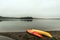 Canada Ontario Lake two rivers grey morning dark atmosphere Canoe Canoes parked beach water in Algonquin National Park