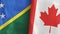 Canada and Solomon Islands two flags textile cloth 3D rendering