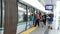 Canada Vancouver 03.22.2024 metro station waterfront delayed Delay Skytrain People waiting on the platform Blue line