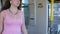 Canada Vancouver Sky Train girl walking along the train car pink dress summer beautiful young European