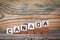 Canada. Wooden letters on the office desk, informative and communication background
