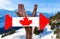 Canada wooden sign with alps background