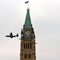Canadian aircraft used in Afghanistan flies by Peace Tower