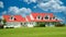 Canadian Farmhouse Home House Front Exterior Cloudy Blue Sky Background