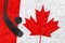Canadian flag image, hockey stick and puck