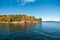 Canadian Lake with Autumn Colours and Blue Sky