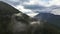 Canadian Mountain Landscape Covered in Clouds. Aerial Nature Background.