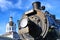 Canadian Pacific Railways historic locomotive in Kingston Ontario Canada with City Hall dome in the background