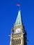 Canadian Parliament Building in Ottawa, Evening Light on Maple Leaf Flag flying above Peace Tower, Ontario, Canada